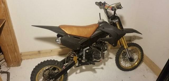 Gold & black Honda 125 with upgraded every thing for pit bike racing  $2k (new with parts 5k)