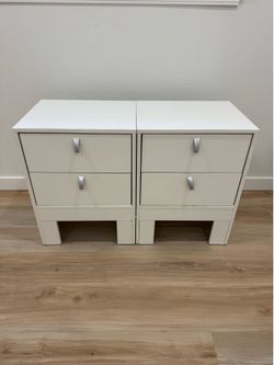 2 white nightstands