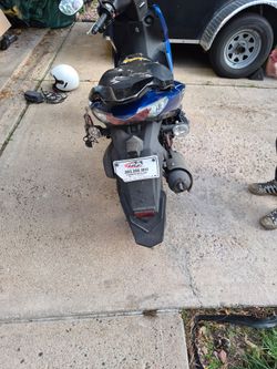 50 CC Blue Super 8 Moped, Includes Helmet and Trickle Charger.