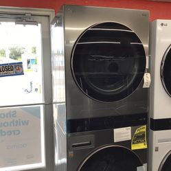 New Scratch And Dent LG Front Load Washer And Dryer Stack Unit Set. 1 year Warranty 
