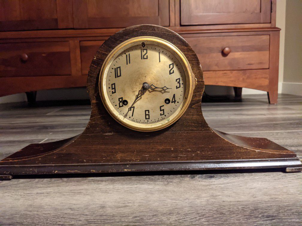 Beautiful old antique New Haven mantel clock with key, pendulum, chime rod. Runs for a few seconds and then stops, so needs a cleaning or tune-up. 