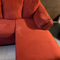 Red sofa with chaise