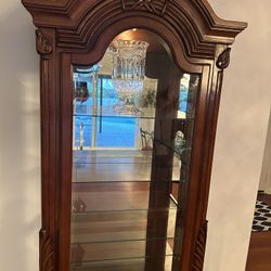 Glass case cabinet H 79” ,  L 32” and W 13