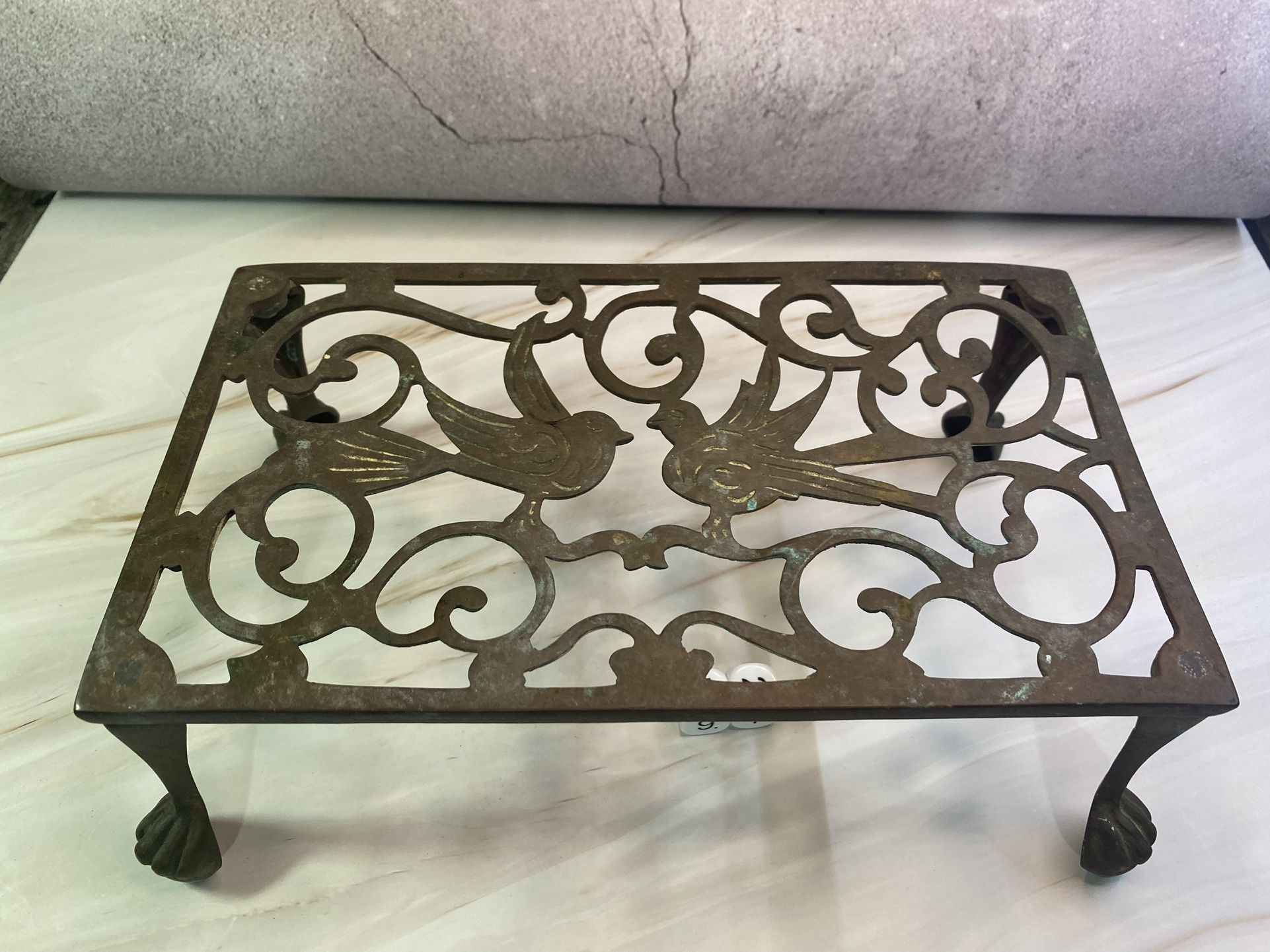 Vintage Brass Kettle Stand Footman With Birds. Paw feet.  DIMENSIONS 10.5ʺW × 6ʺD × 4ʺH. 