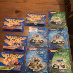 5 Hotwheels Atomix and 4Micro Cars with launchers in the package . 