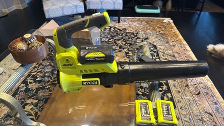 Ryobi leaf blower with two battery chargers and one 40v battery