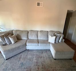 Living spaces couch with chase.