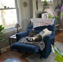 Dark blue velvet recliner