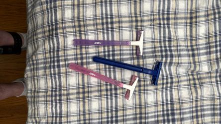 Two BIC razors one Gillette razer