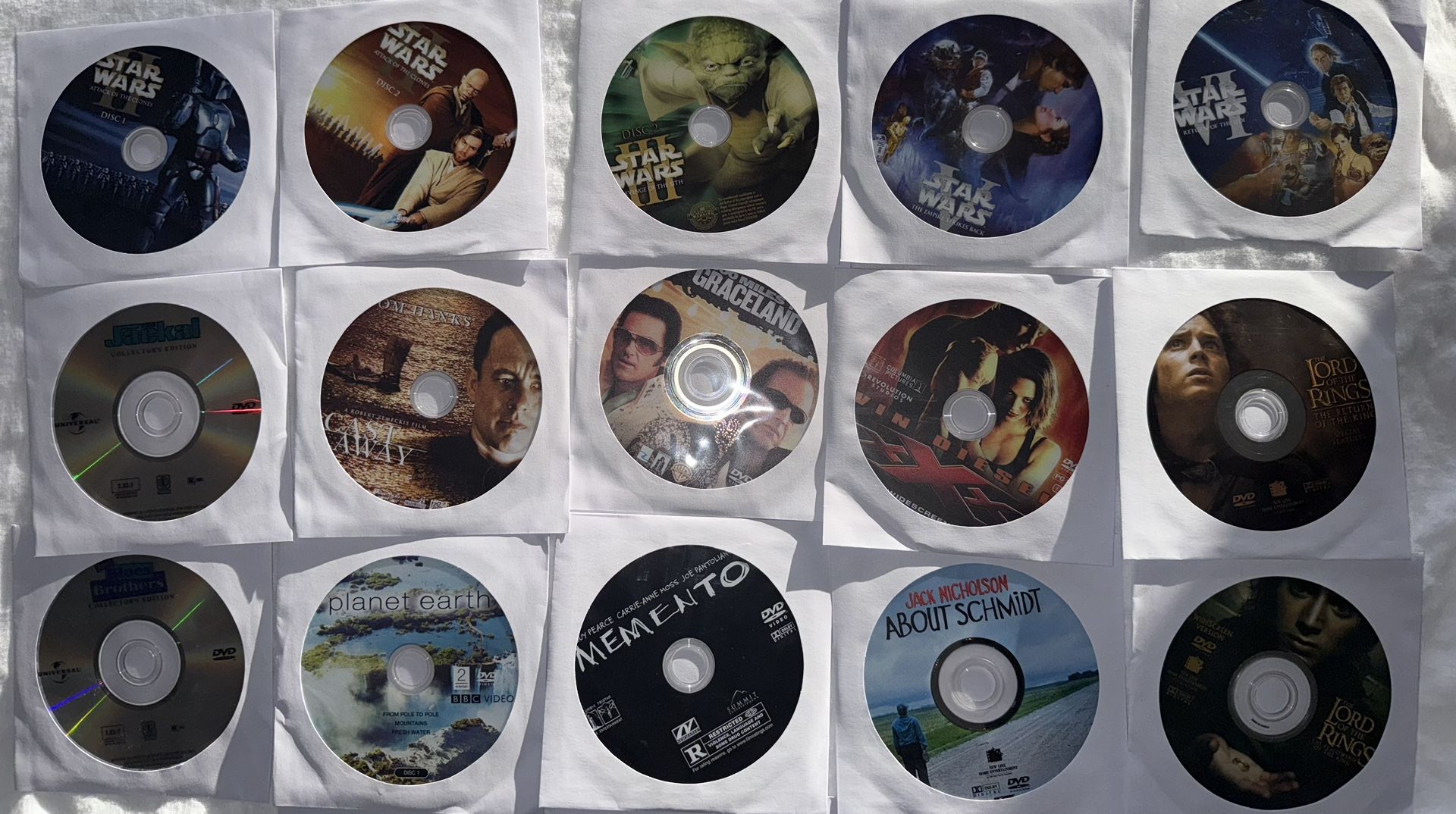 100 Disc DVD Lot- Harry Potter, Star Wars, Indiana Jones, 007, Simpsons