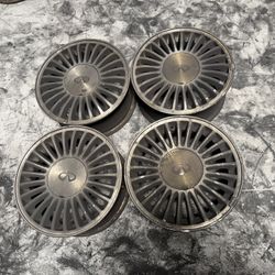 Infiniti or Nissan 15 inch Aluminum wheels and caps. 5 on 114.3mm   