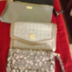 2 wallets, 1 makeup bag