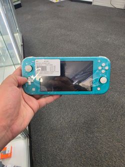 Nintendo Switch Lite with Charger. ASK FOR RYAN. #4(contact info removed)1-01