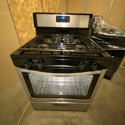 Whirlpool gas stove 4 burners stainless st. 30”