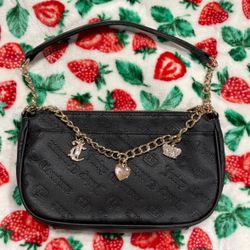 Juicy Couture Not Your Babe Shoulder Bag in black with gold chain and charm accents