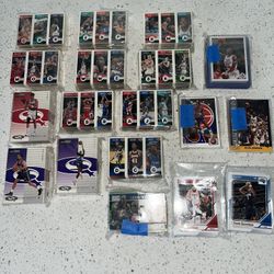 17 packages of basketball cards in bags