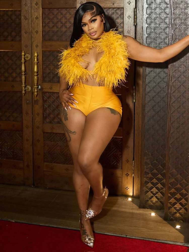 Two Piece Feathered Top And Spandex Shorts