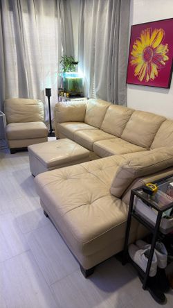 Comfortable beige leather sectional couch