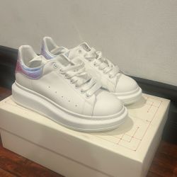 Alexander Mcqueens with versace bag