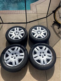 2008 -2014 dodge avenger stock rims with new hubcaps
