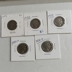 five old five-cent coins