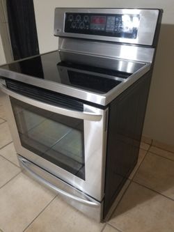 Stainless steel LG Electric stove 5 Burner Free Deliver And Install 3 Month Warranty...