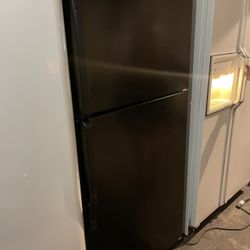 Whirlpool black refrigerator works great we sell them all the time