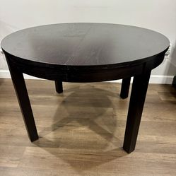 BJURSTA Extendable table, brown-black, 45 1/4/65 3/8 "