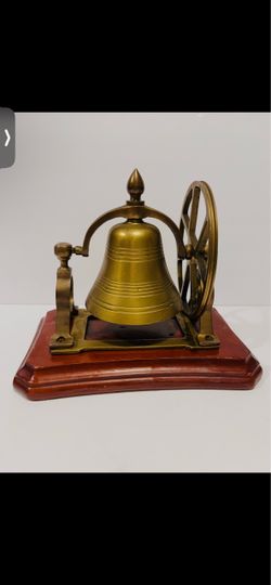 Vintage 1950’s Solid Brass on Wood Stand Ships Bell Nautical Table Decor . Good vintage condition, minimal wearing marks on wood. Size is 8”-7”-5”