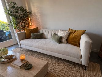 Cream channel tufted sofa