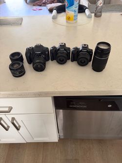 3 new canon cameras with 6 lenses
