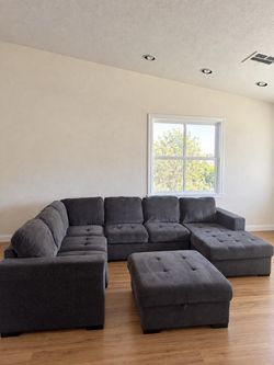 Spacious Dark Gray Sectional with Pull-Out  & Ottoman with Storage
