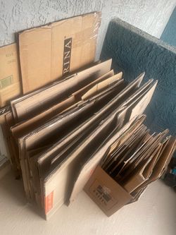 Moving boxes + paper and bubble wrap
