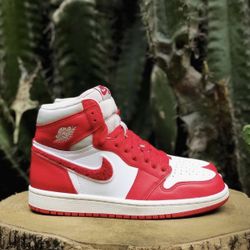 Air Jordan 1’s.  University  Red’s 