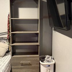 Closet system with drawers and clothes bar