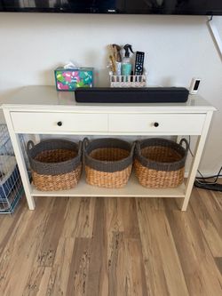 Entertainment center with baskets