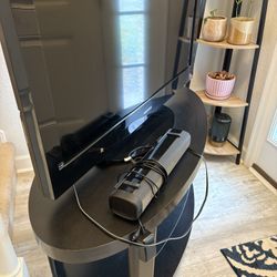Tv Stand, Sound bar and Tv