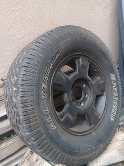Para de rines con llanta medio uso para troca Ford