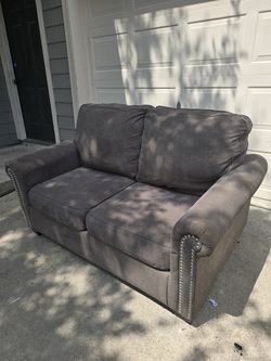 Gray Fabric Loveseat with Nailhead Trim