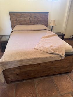 Wooden queen bed with mattress and storage drawers