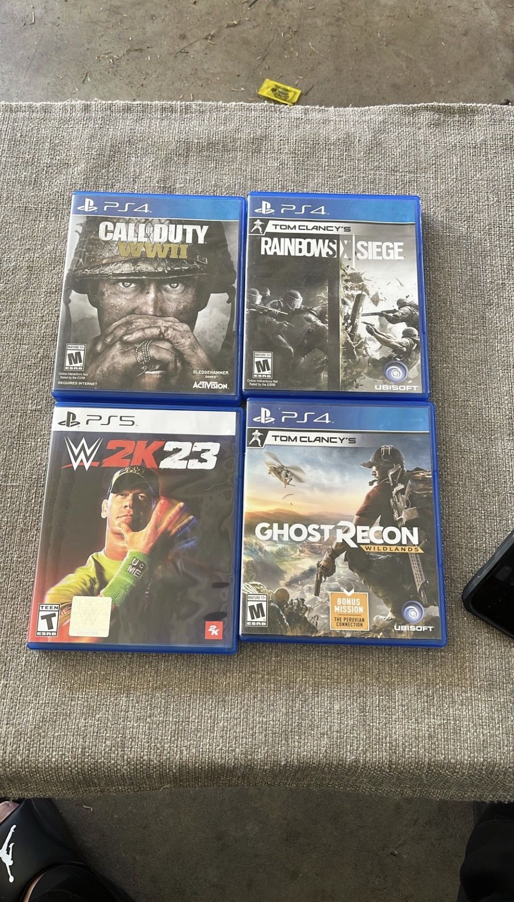 PS4/PS5 Game Bundle – WWE 2K23, Ghost Recon Wildlands, COD WWII, Rainbow Six Siege (Open Box, Like New)