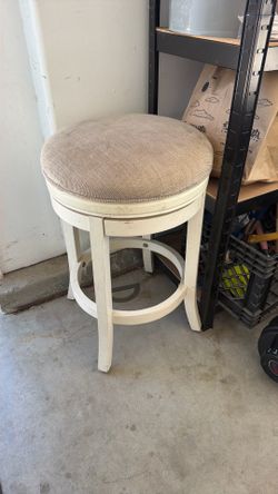 Beige swivel stool