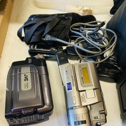 Three Video Camcorders And A Cable Extender 