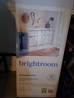 Brightroom sliding bin frame is a white storage unit for  organization
