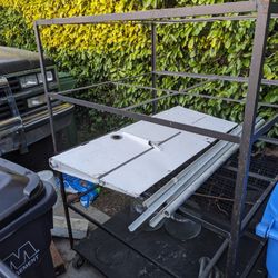 Rolling Cart Roughly 4 feet Wide And Deep. 5.5 Feet Tall
