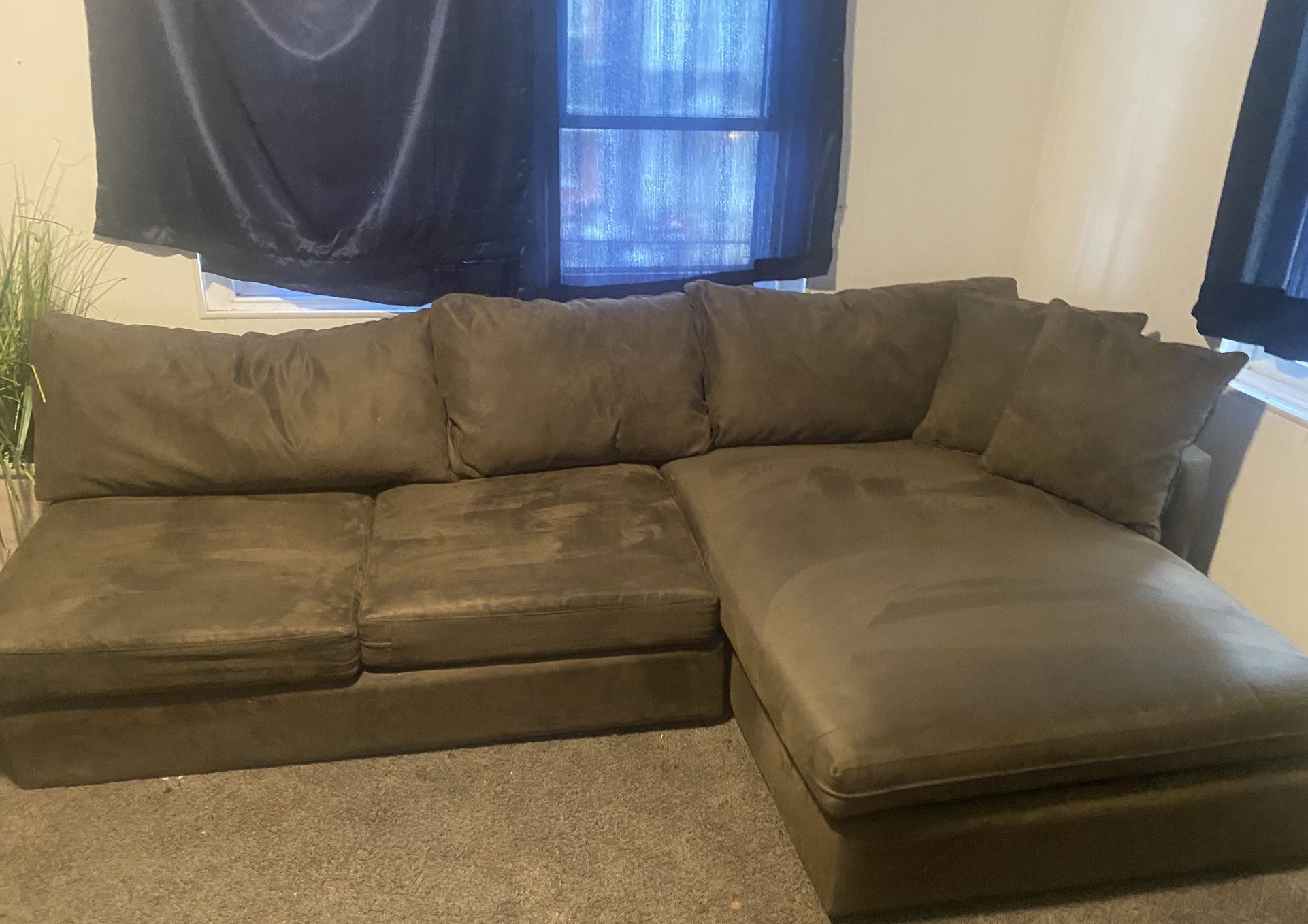 Sectional suede couch with cushions used clean
