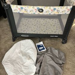 Graco Pack and Play Portable Playard, Push Button Compact Fold, Carnival & 2 Crib Sheets