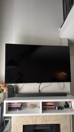 Large Flat Screen TV Wall Mounted 55”