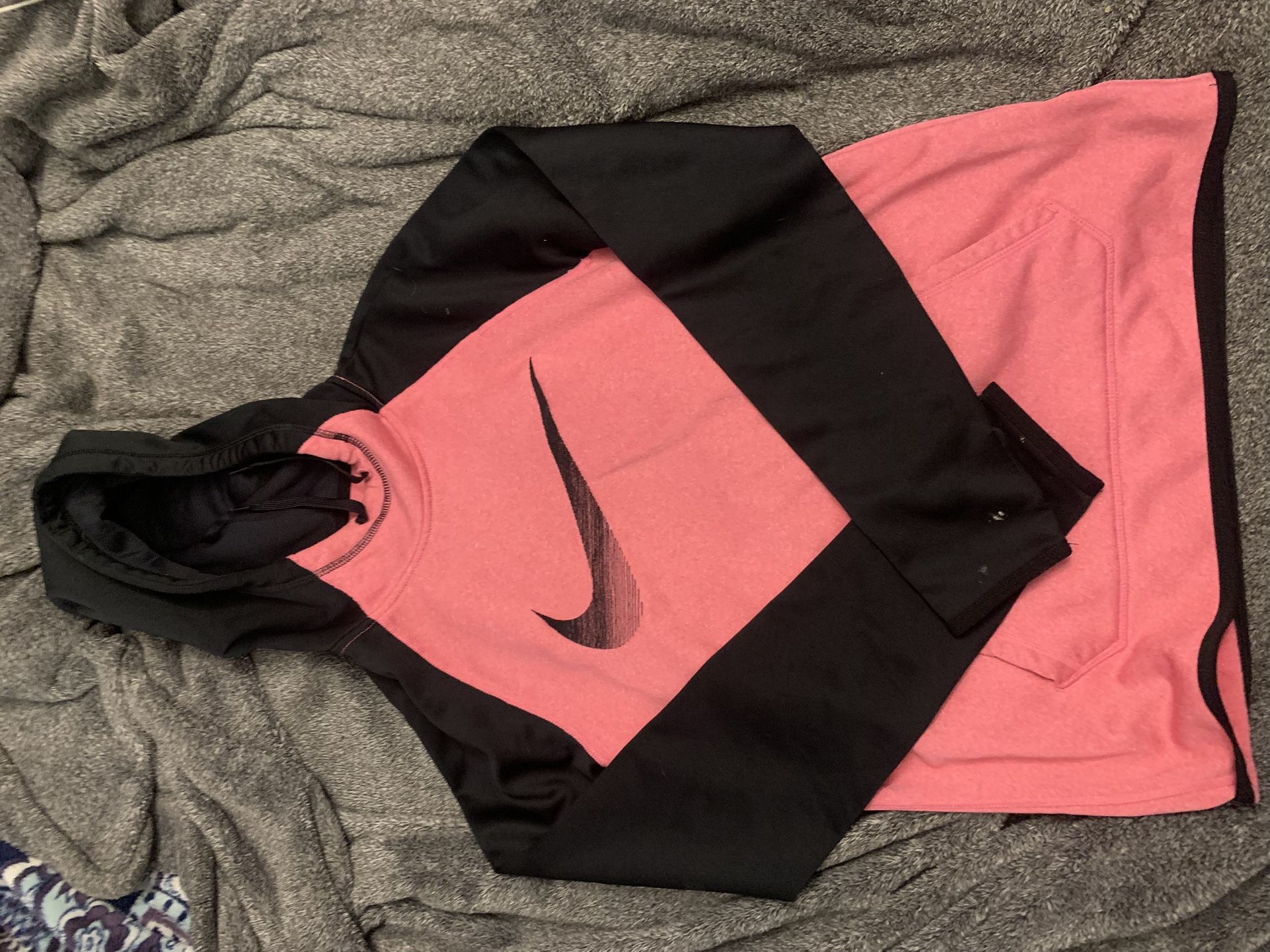 pink and black nike therma fit hoodie