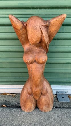 Hand carved woman sculpture